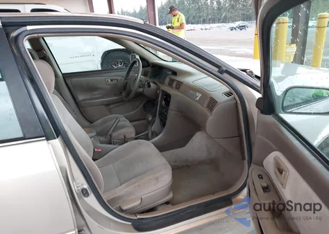 1999 Toyota Camry Le from USA, damaged, VIN 4T1BG22K1XU890778